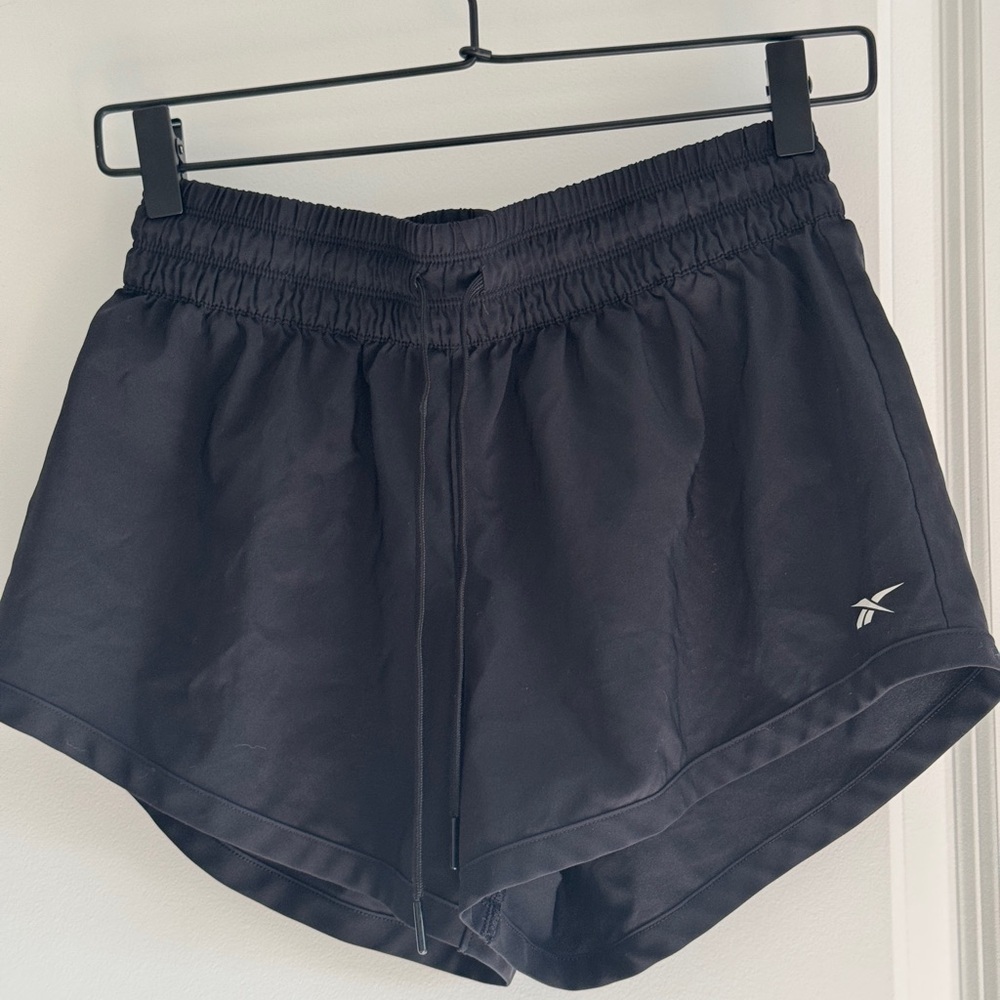 Reebok running shorts.